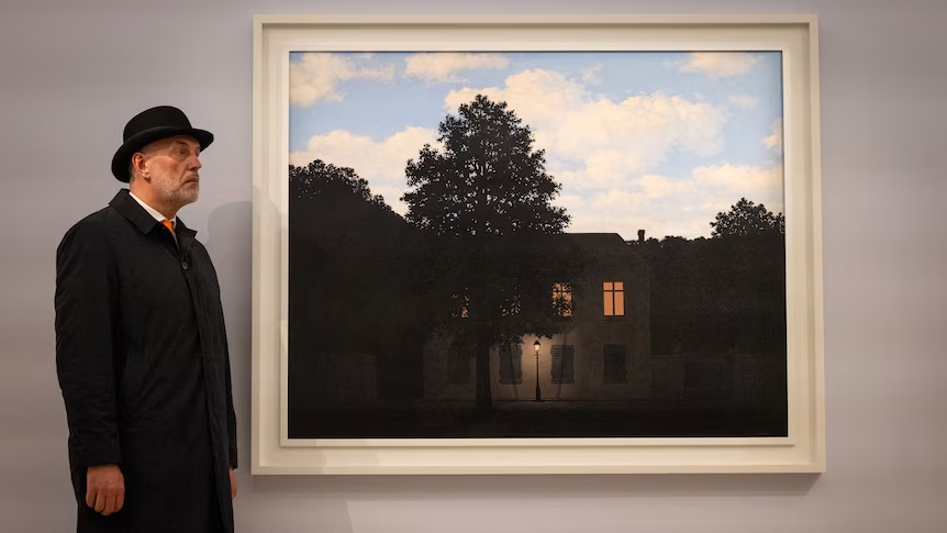 The Story Behind the Magritte Empire of Light Series